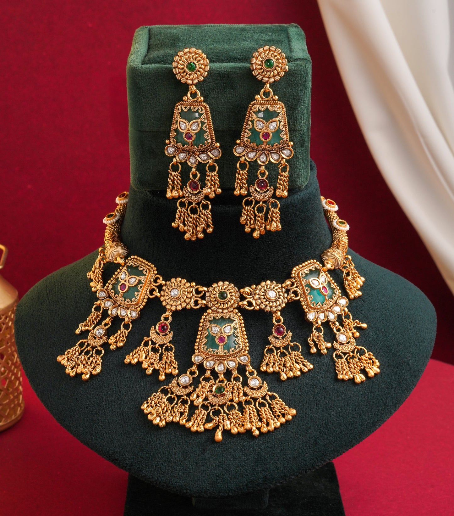 Traditional Kundan Necklace Set with Green Stones & Jhumka Earrings