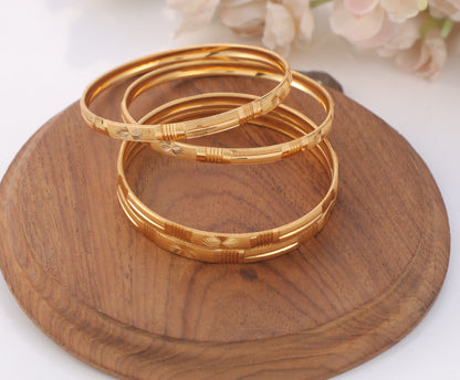 4-Piece Gold-Plated Linear Textured Bangle Set - Traditional Stackable Floral Engraved Bracelets