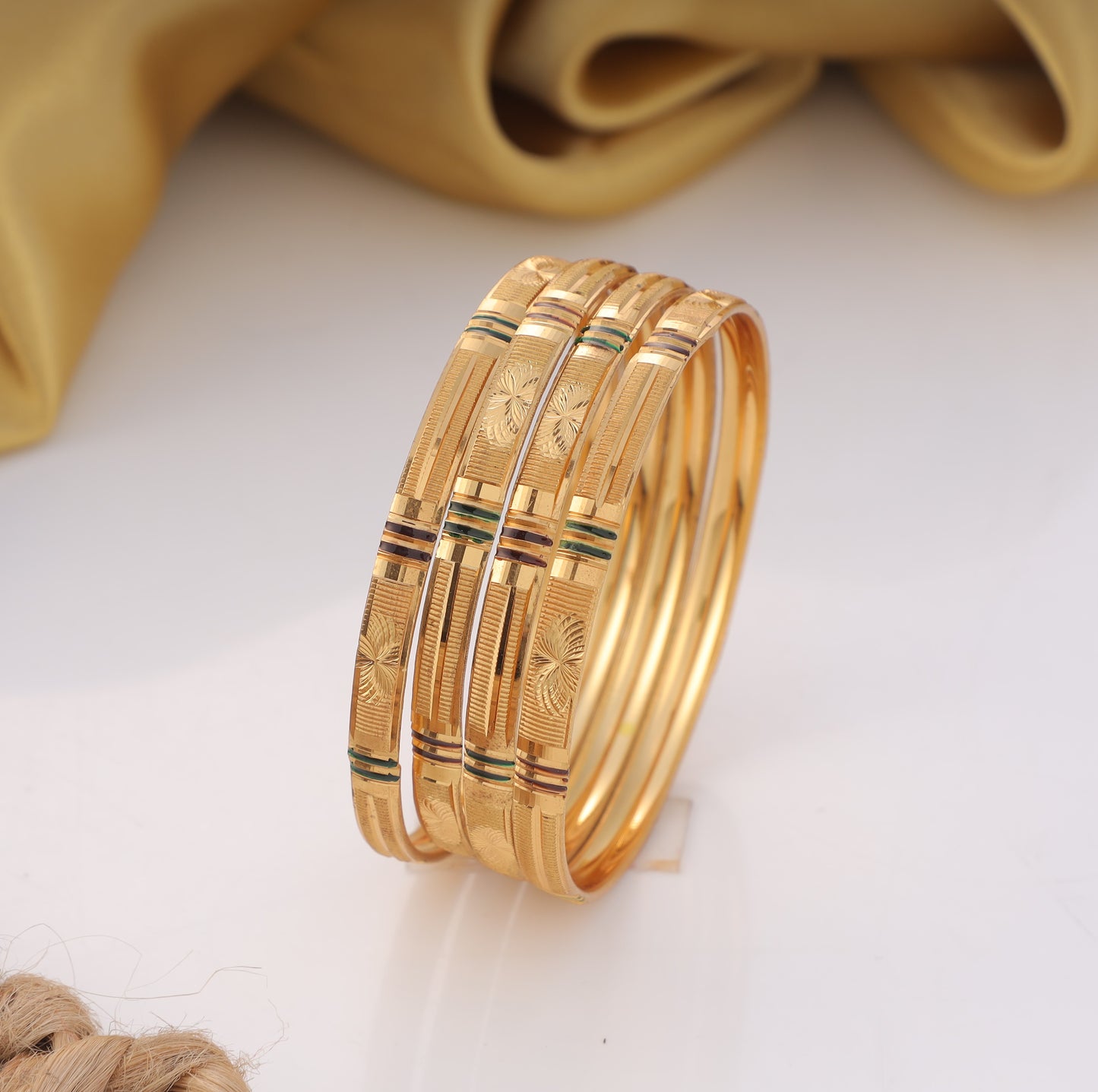 4-Piece Gold-Plated Linear Textured Bangle Set Traditional Floral Engraved Stackable Bracelets