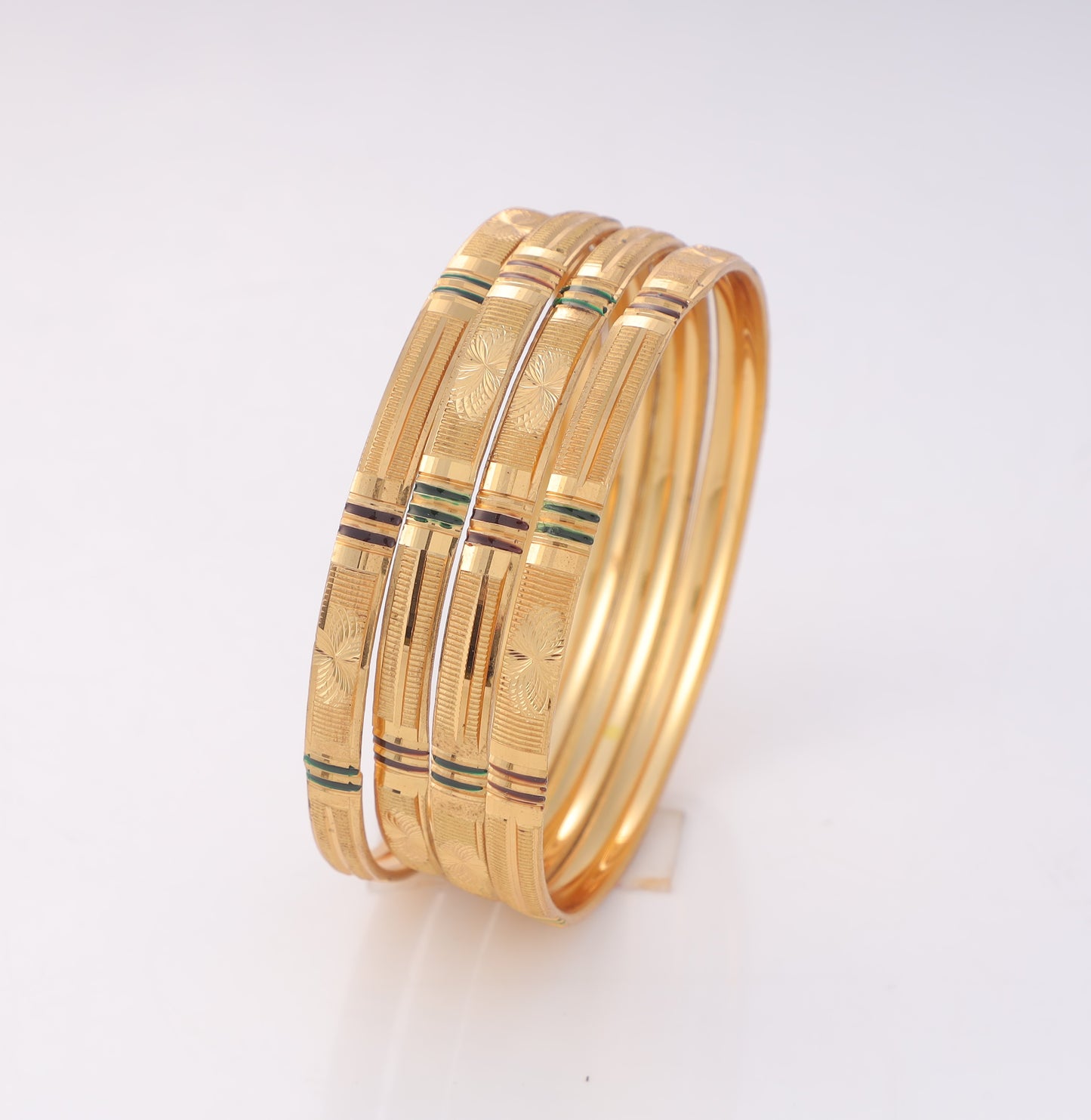 4-Piece Gold-Plated Linear Textured Bangle Set Traditional Floral Engraved Stackable Bracelets