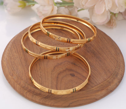 4-Piece Gold-Plated Linear Textured Bangle Set Traditional Floral Engraved Stackable Bracelets