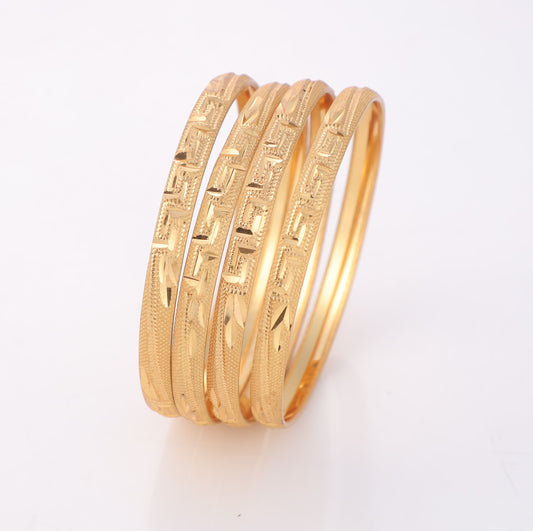 4-Piece Gold-Plated Geometric Textured Bangle Set Traditional Greek Key Inspired Bracelets