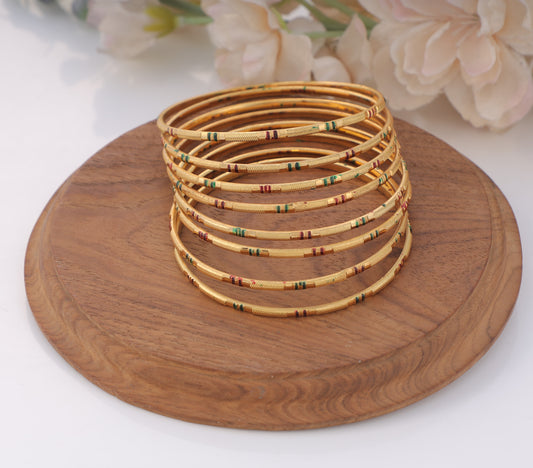 4-Piece Gold-Plated Bangle Set - Traditional Linear Etched & Starburst Engraved Bracelets