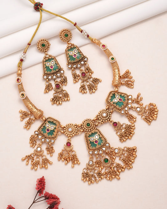 Traditional Kundan Necklace Set with Green Stones & Jhumka Earrings
