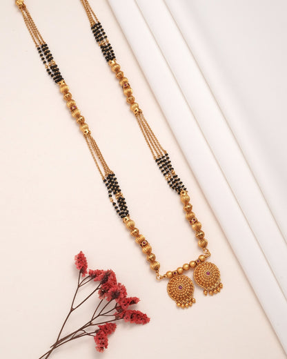 Traditional Gold-Plated Long Mangalsutra with Black Beads and Floral Pendant