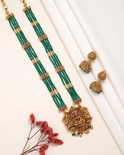 Traditional Antique Gold-Plated Lakshmi Pendant Haram - Ruby Pink Multi-Strand Bead Long Necklace with Matching Jhumka Earrings