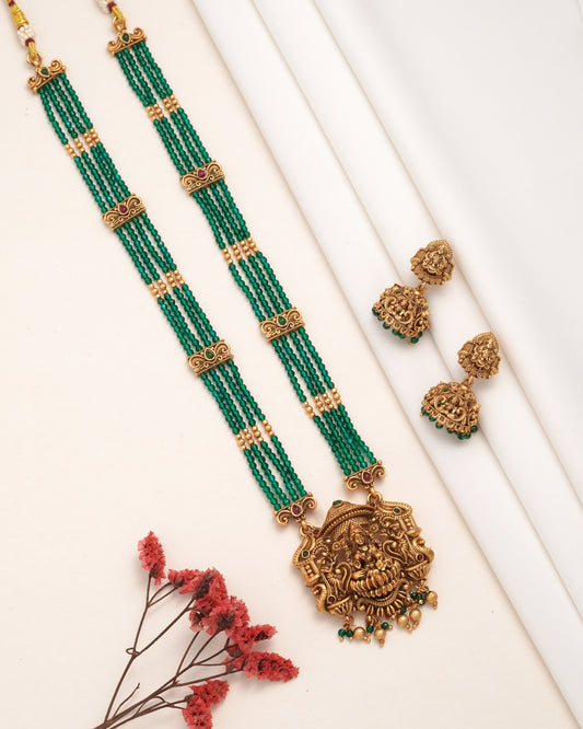 Traditional Antique Gold-Plated Lakshmi Pendant Haram - Ruby Pink Multi-Strand Bead Long Necklace with Matching Jhumka Earrings