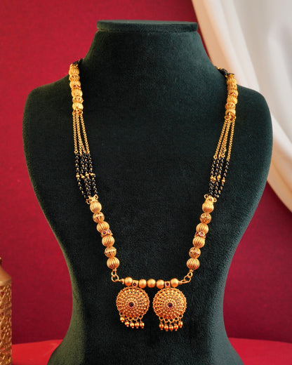 Traditional Gold-Plated Long Mangalsutra with Black Beads and Floral Pendant