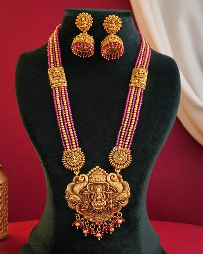 Traditional Antique Gold-Plated Lakshmi Pendant Haram - Ruby Pink Multi-Strand Bead Long Necklace with Matching Jhumka Earrings