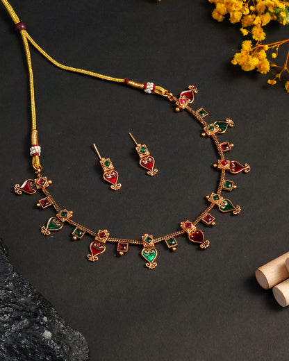 Traditional Gold Tone Paisley Necklace Set with Red & Green Stones