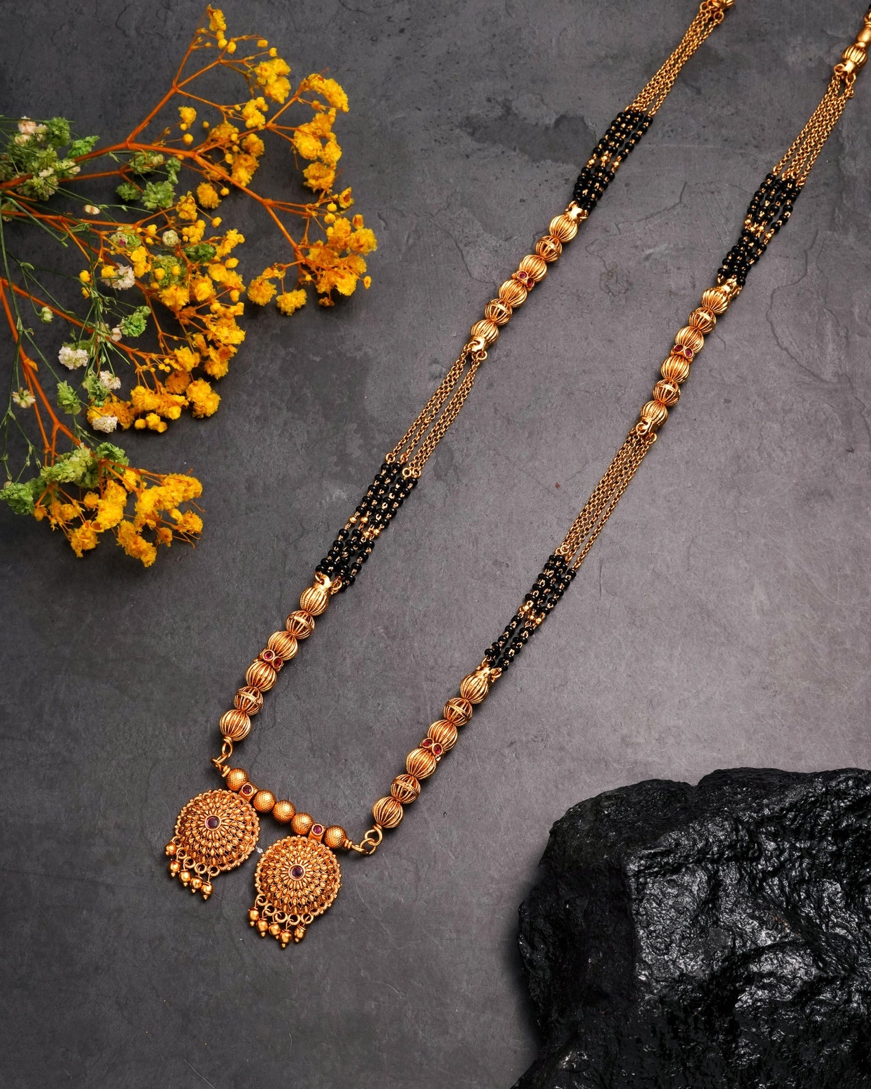 Traditional Gold-Plated Long Mangalsutra with Black Beads and Floral Pendant