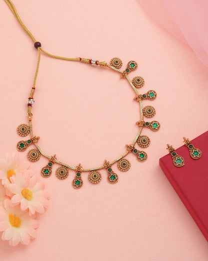 Antique Matte Gold-Plated Choker Necklace with Green Star Stones - Traditional South Indian Addigai Style Set with Matching Drop Earrings