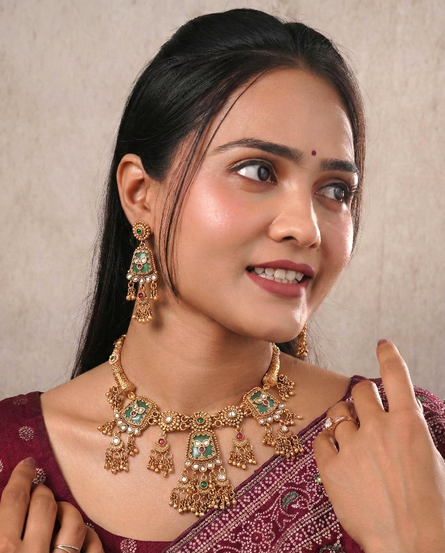 Traditional Kundan Necklace Set with Green Stones & Jhumka Earrings
